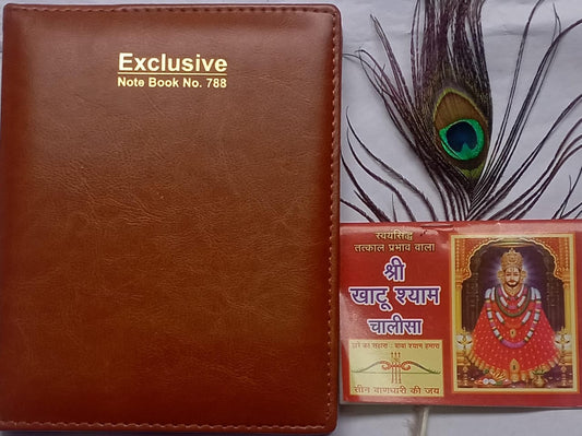 Brown notebook with 'Exclusive' branding next to a small book and peacock feather