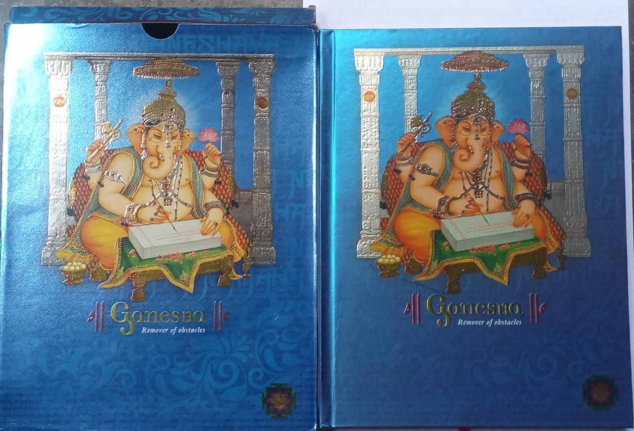 Blue notebook with an illustration of Ganesha on the cover