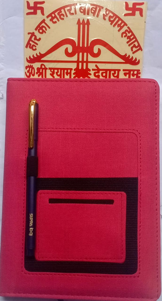 Red notebook with a pen and card holder, featuring a religious symbol on a white background.