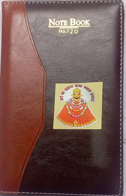 Notebook with a brown and black cover featuring an emblem on a white background