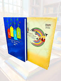 Two colorful diaries with rainbow designs on a white background