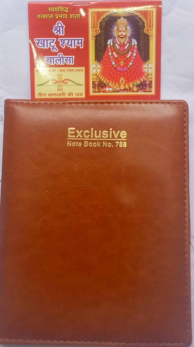 Brown notebook with 'Exclusive Note Book No. 788' text, placed on a white background with a red book featuring an image of a deity above it.