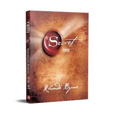 Book titled 'The Secret' by Rhonda Byrne with a brown cover