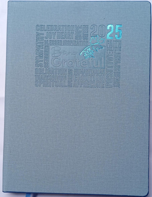 Blue notebook with embossed text and design on a white background